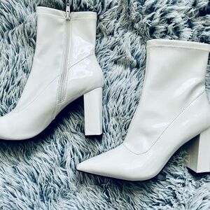 New. White patent leather boots